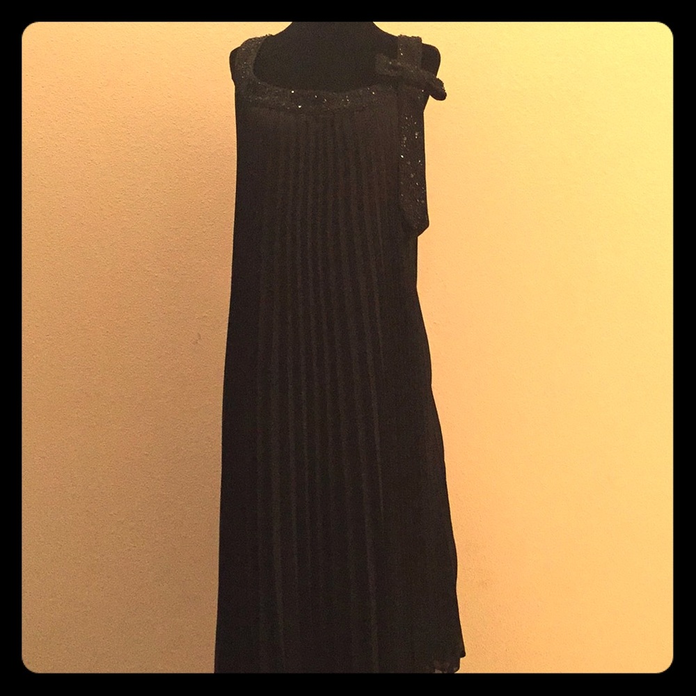 Accordion pleated dress with sequin bow and neck